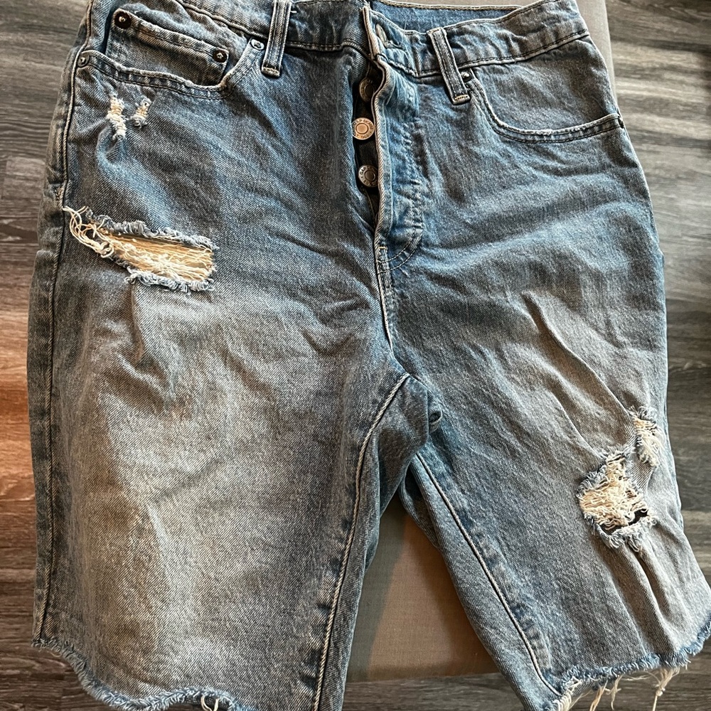 Size 4 distressed hem denim shorts